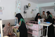 پرچم‌گردانی خدام شاهچراغ (ع) در بیمارستان نمازی؛ فضای معنوی در بخش‌های اطفال